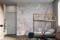 Girls playing with bunnies in a dreamy pastel floral background.