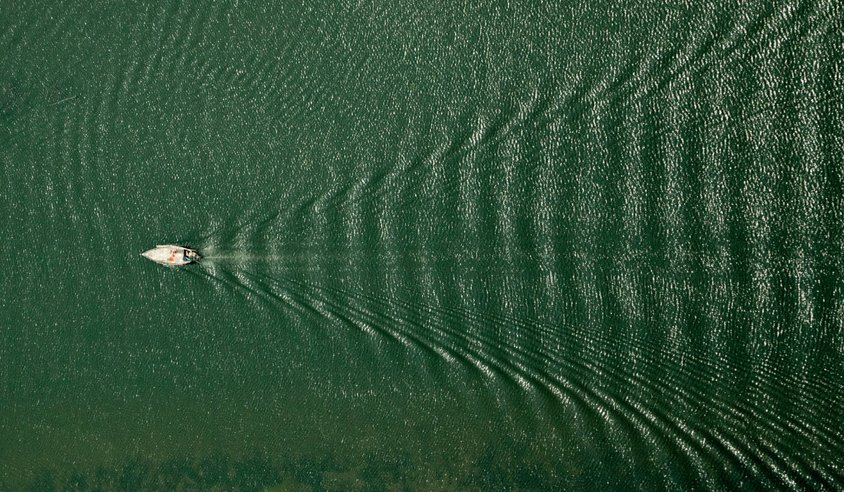Aerial Sailing Boat Wallpaper in your room — zoomed