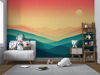 Dreamy sunset over layered mountains
