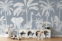 Monochrome Jungle Blue mural creates a calming ambiance.
