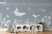 Monochrome Sea Blue mural creates a calming ambiance.



