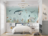 Artistic wall mural featuring waves and marine elements
