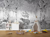 Black and white mural featuring a peaceful forest scene.
