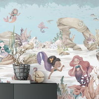 Decorative mural showcasing a whimsical mermaid scene
