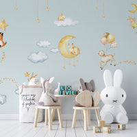 Kids' room decor with Blue Sweet Dreams wallpaper.
