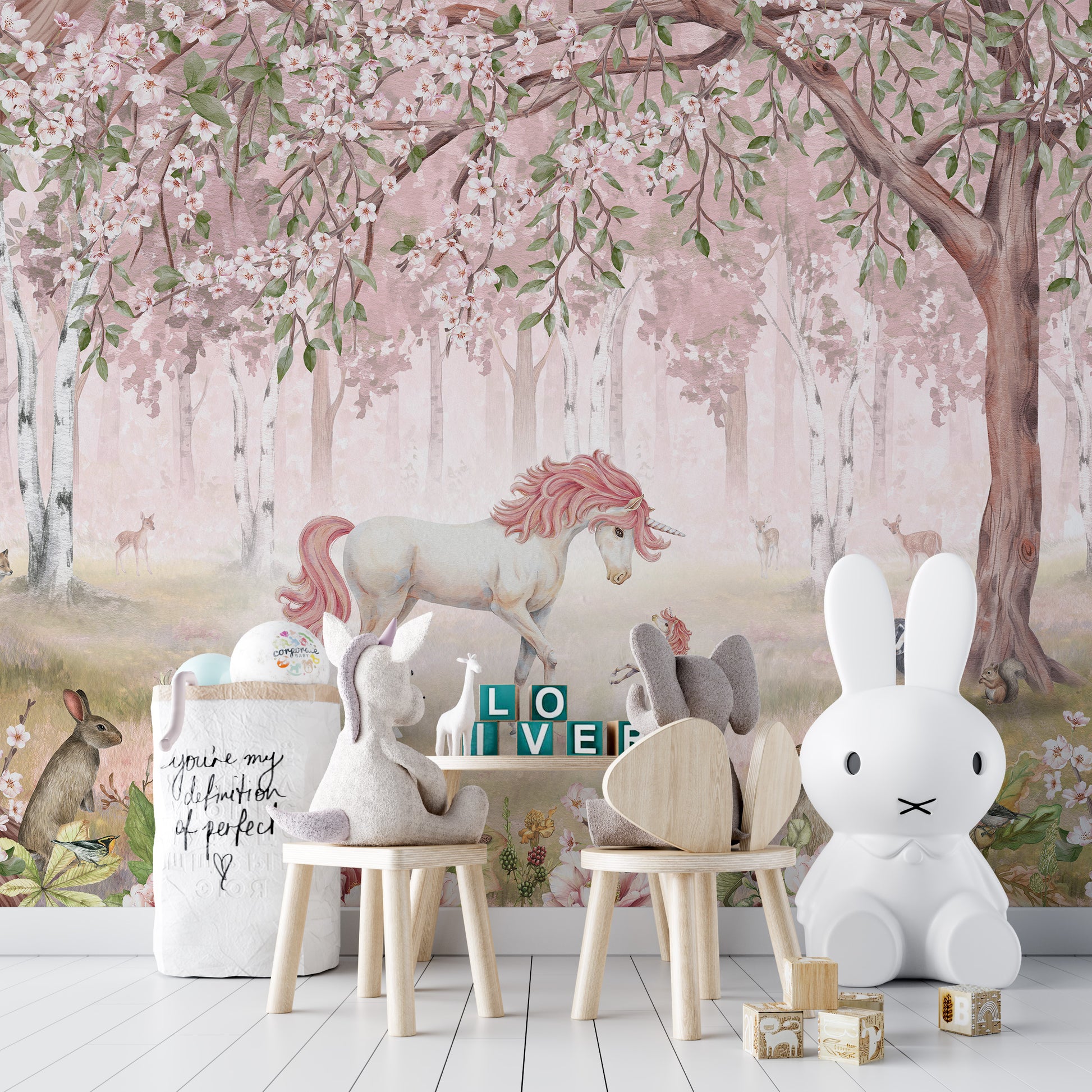 Pink forest-themed Unicorn mural for whimsical decor.
