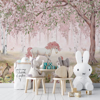 Pink forest-themed Unicorn mural for whimsical decor.
