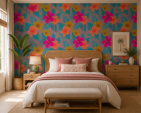 Mustard and orange hibiscus among teal leaves on mauve wallpaper