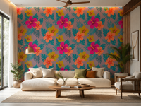 Bold magenta and orange hibiscus flowers on teal leaf tropical wallpaper in living room