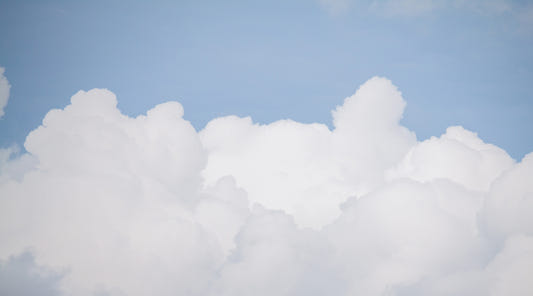 Serene Azure Sky with Clouds Wallpaper Mural