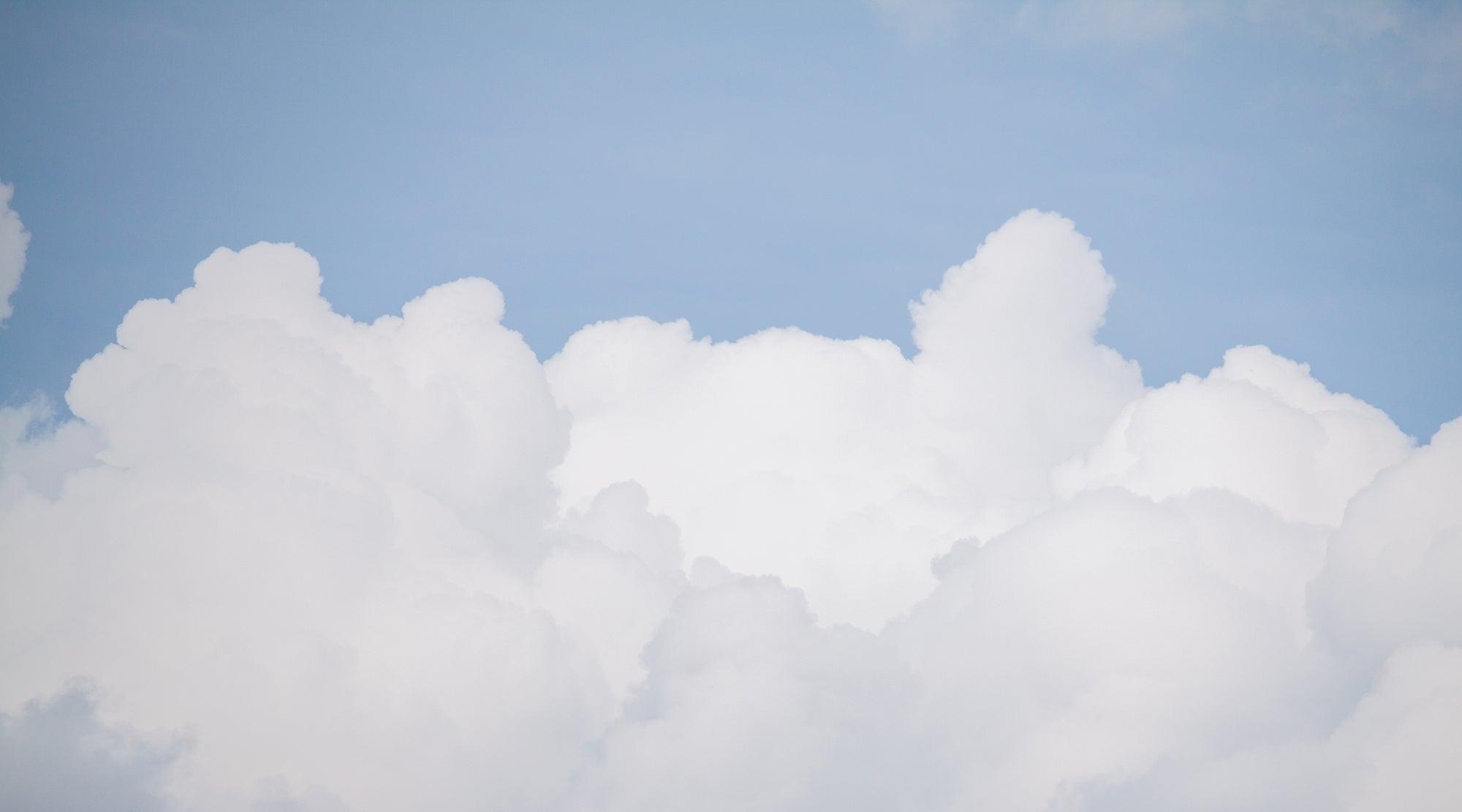 Serene Azure Sky with Clouds Wallpaper Mural