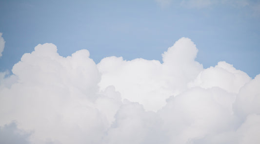 Serene Azure Sky with Clouds Wallpaper Mural