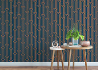 Abstract Art Deco Arches Orange Color Wallpaper behind small wooden tables.