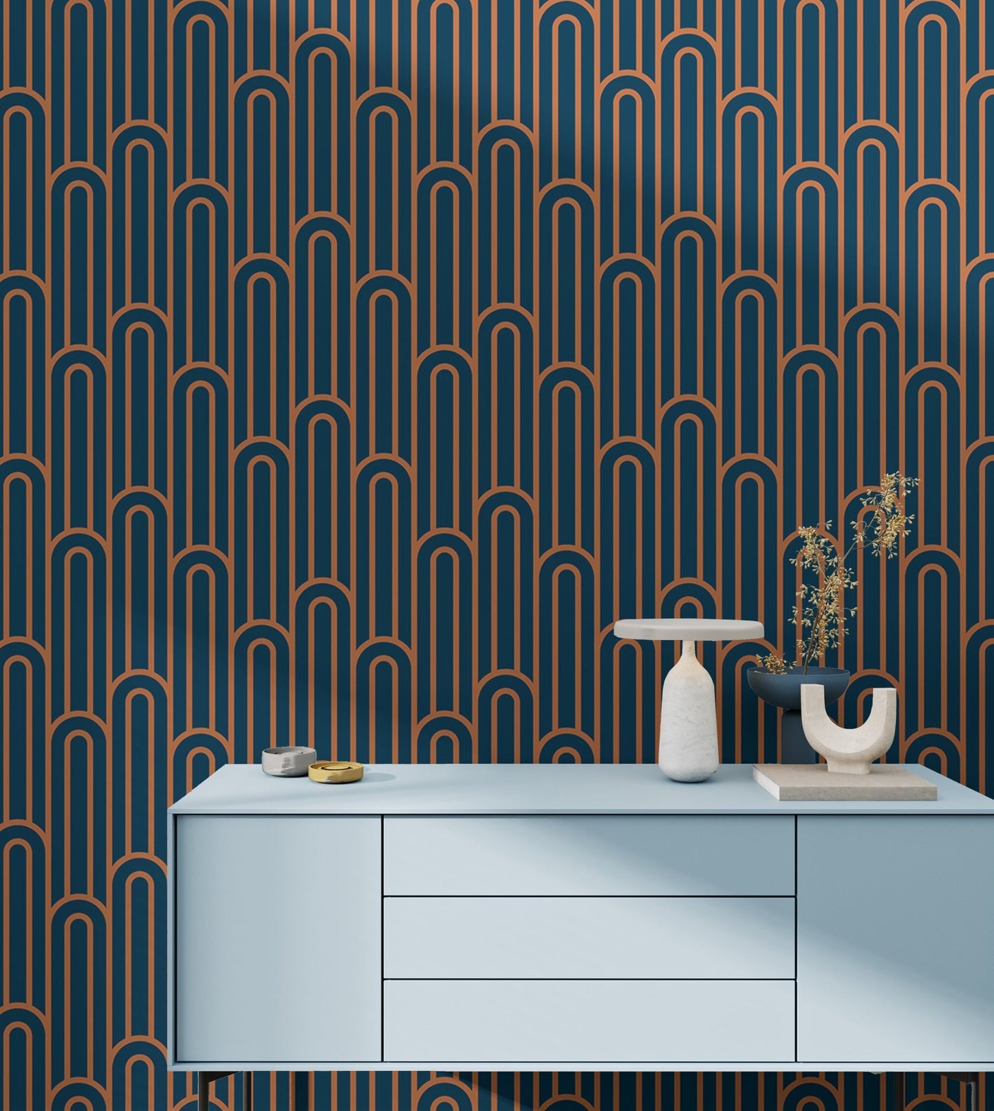 Abstract Art Deco Arches Orange Color Wallpaper behind a light blue sideboard.