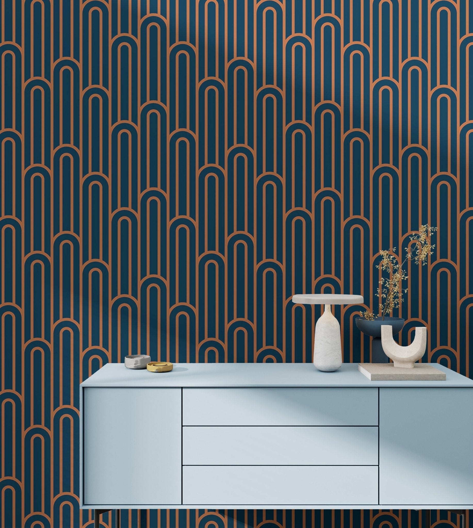 Abstract Art Deco Arches Orange Color Wallpaper behind a light blue sideboard.