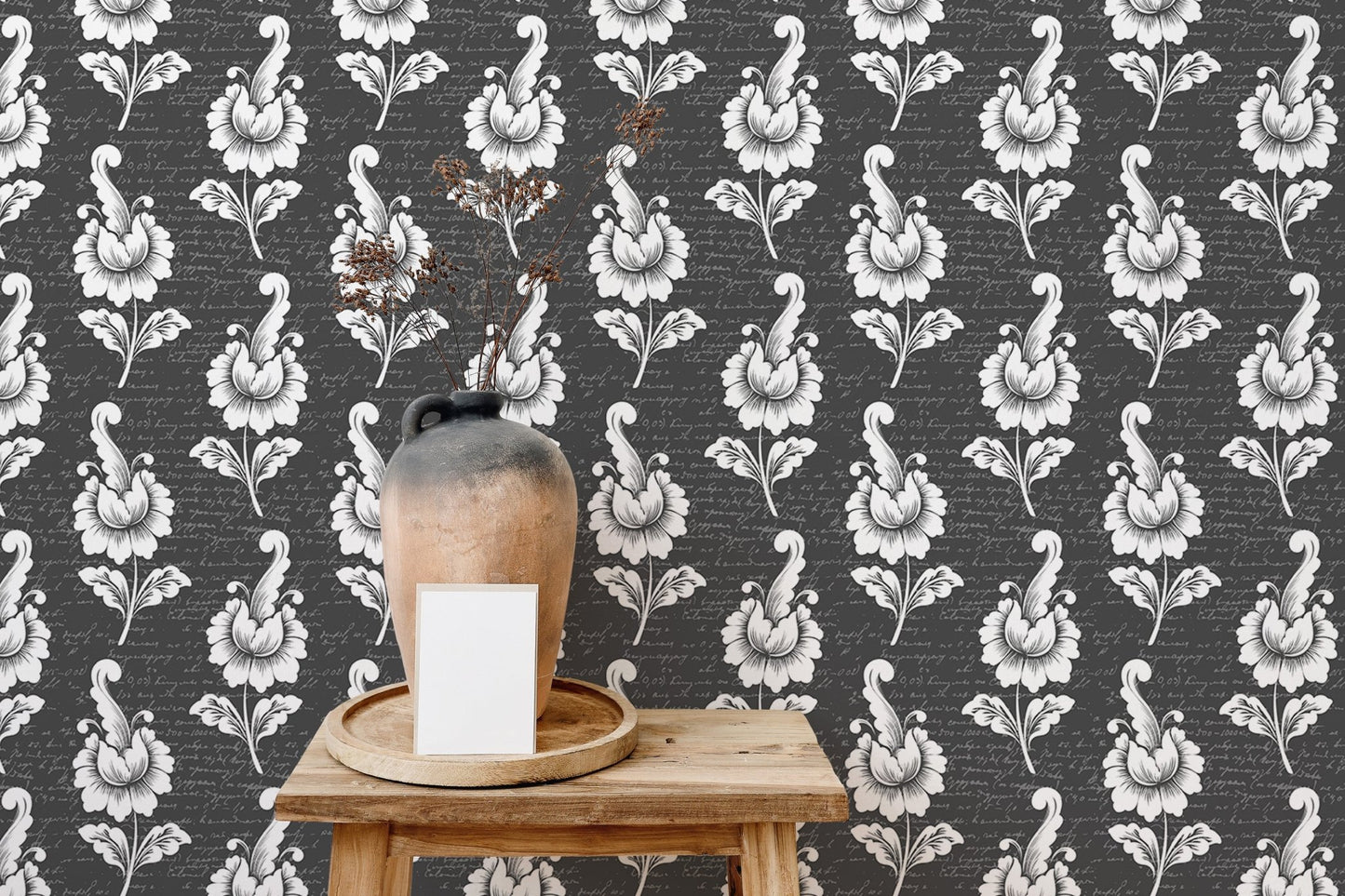 Dark damask wallpaper behind a wooden side table and clay vase.