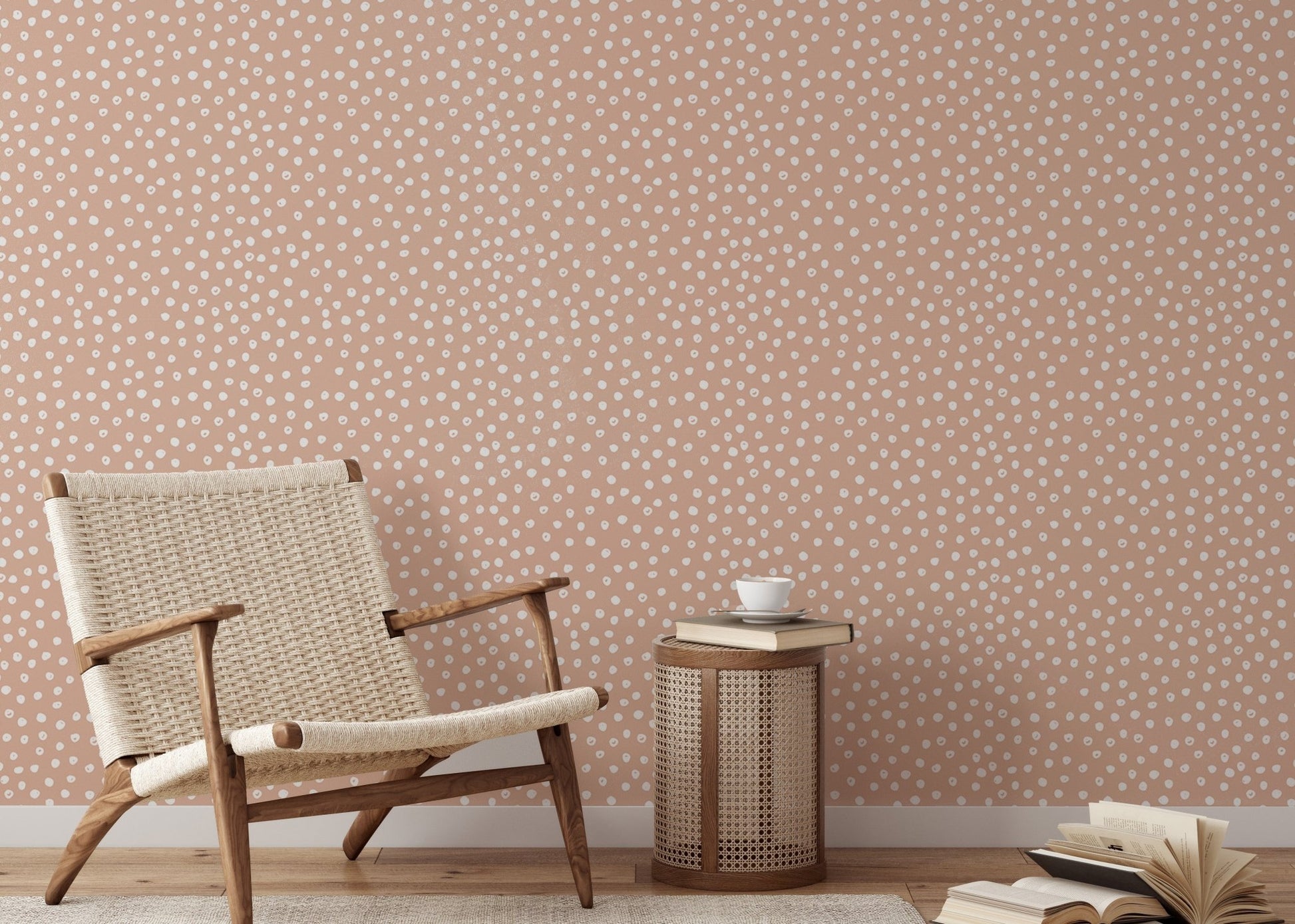 Textured beige brush dots wallpaper  behind chair in reading area.
