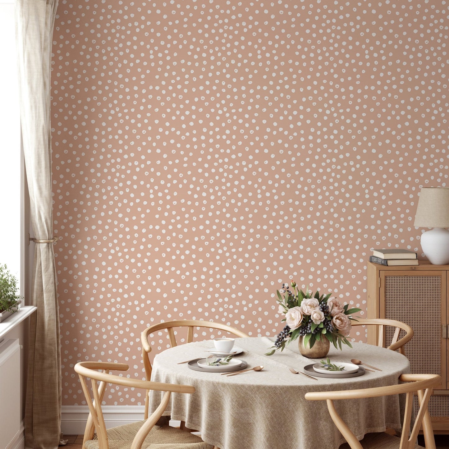 Beige and white brush polka dots abstract wallpaper in dining area.
