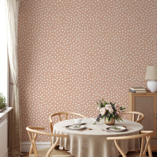Beige and white brush polka dots abstract wallpaper in dining area.
