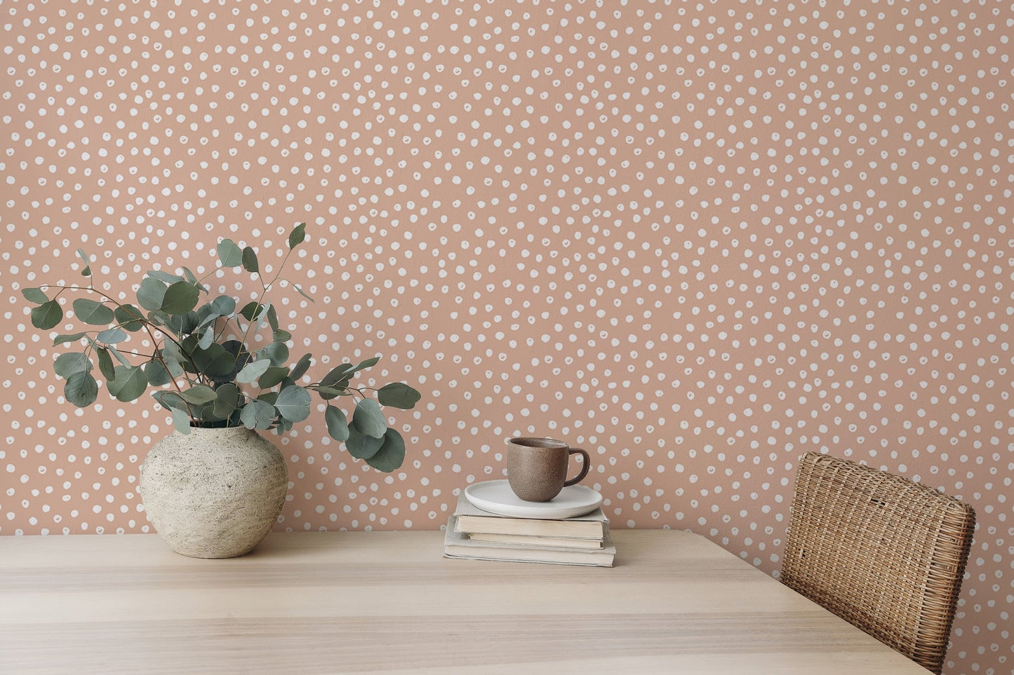 Neutral abstract polka dots wallpaper with brush effect in dining area.
