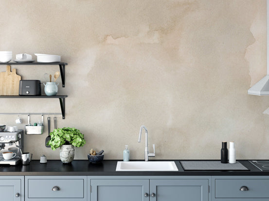 Textured beige wallpaper mural with organic ink flow design.