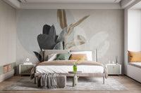 Modern guest room featuring neutral tones and abstract botanical wall mural.
