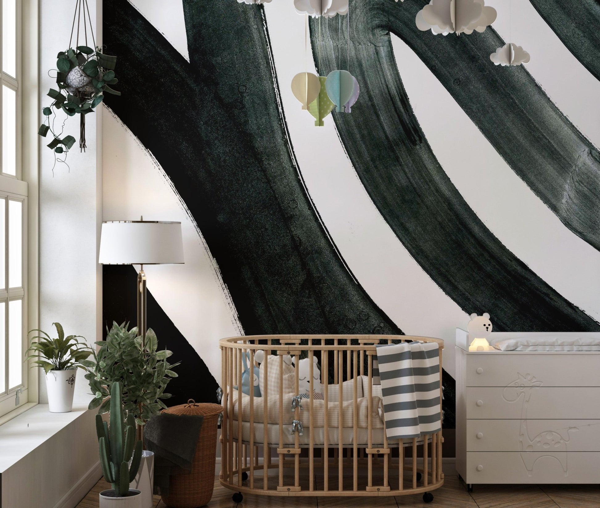 Black ink fusion mural with dynamic abstract patterns in kids room.
