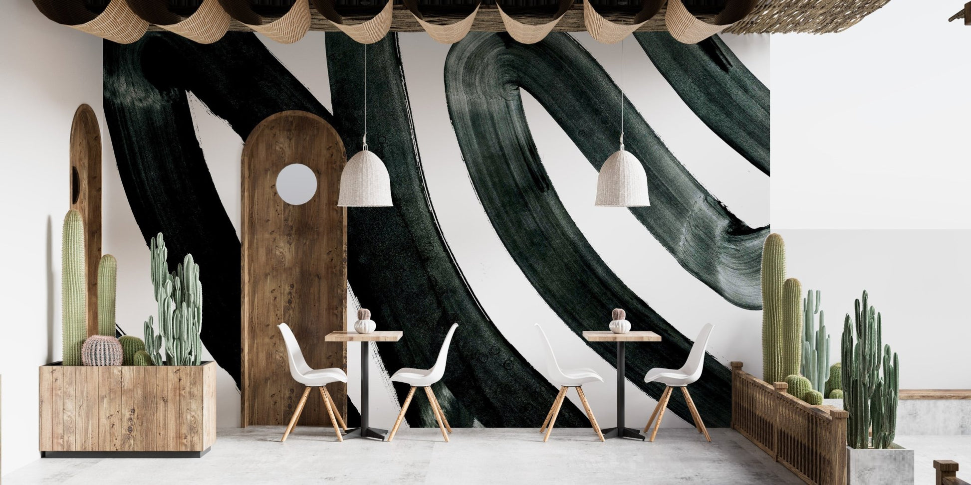 Artistic black ink wall mural for a contemporary aesthetic in cafe area
