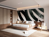 Dynamic black ink mural with artistic and flowing designs in bright bedroom.