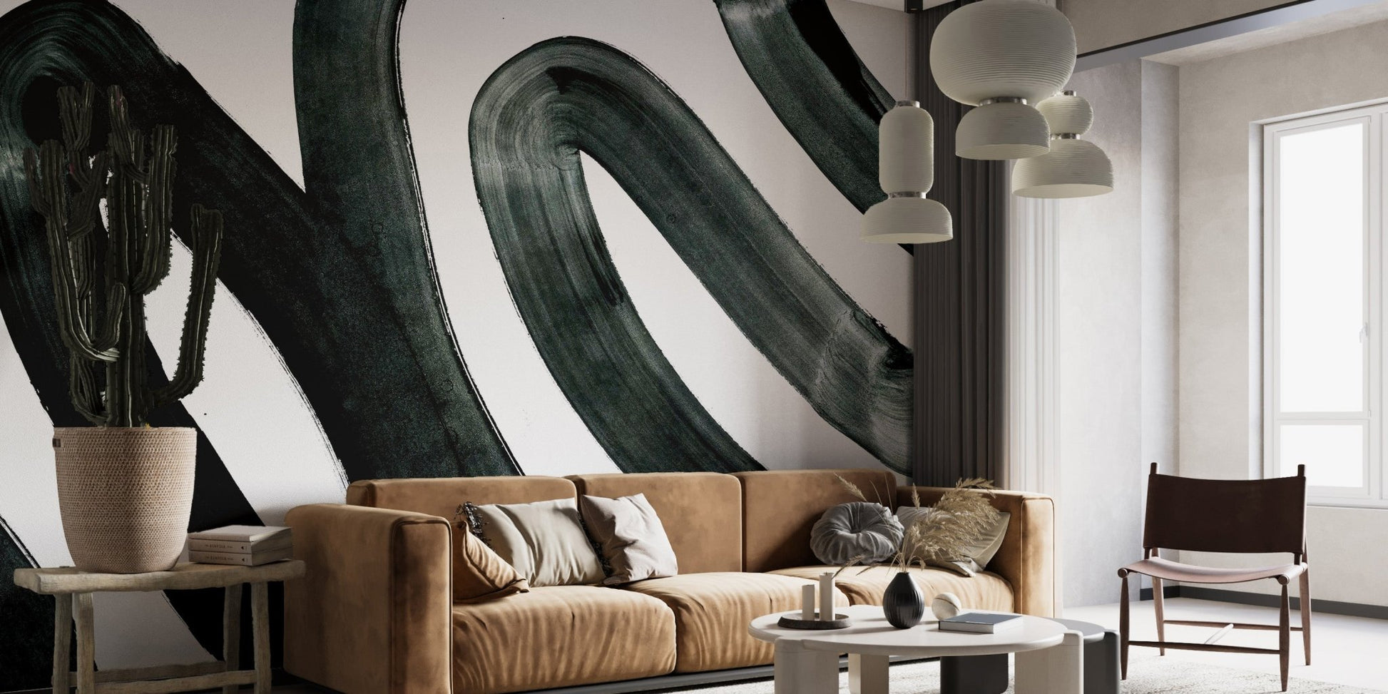 Abstract mural featuring striking black ink fusion design behind brow sofa.