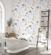 Minimalist flower wallpaper in a bathroom next to a white freestanding tub.