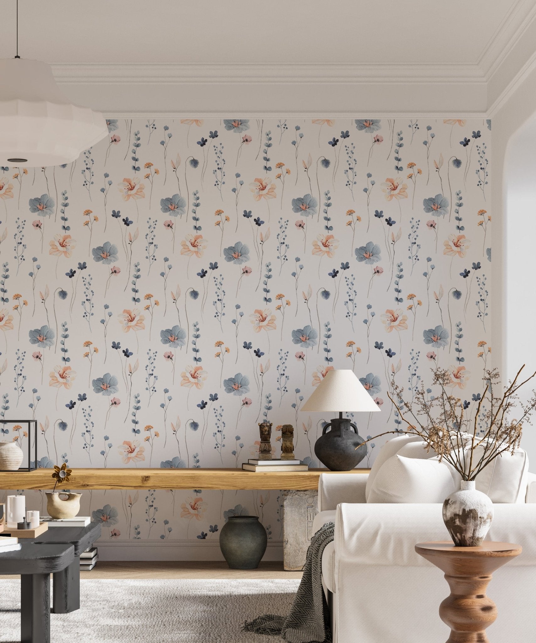 Blue and beige botanical wallpaper in a bright home with a wooden desk.