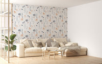 Abstract flower leaves wallpaper in a large living area with a beige sofa.