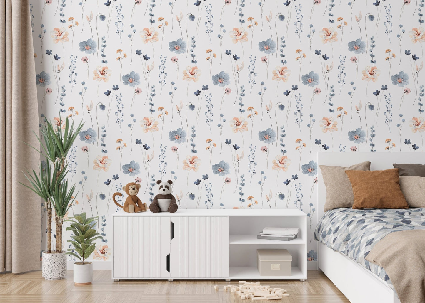 Abstract blue and beige flower leaves wallpaper in a bedroom with a white cabinet.