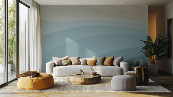 Minimalist blue wall mural in muted ocean color palette.