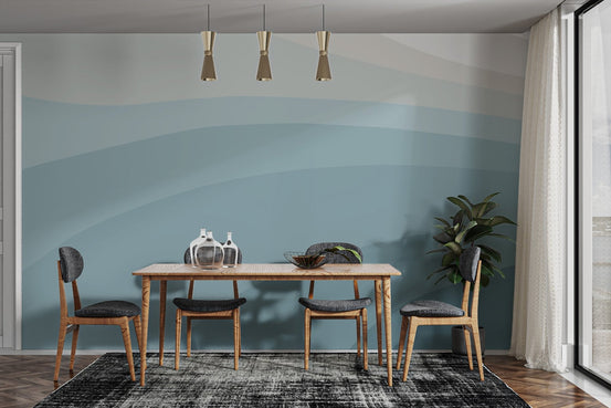 Abstract blue wallpaper mural with layered teal wave design.