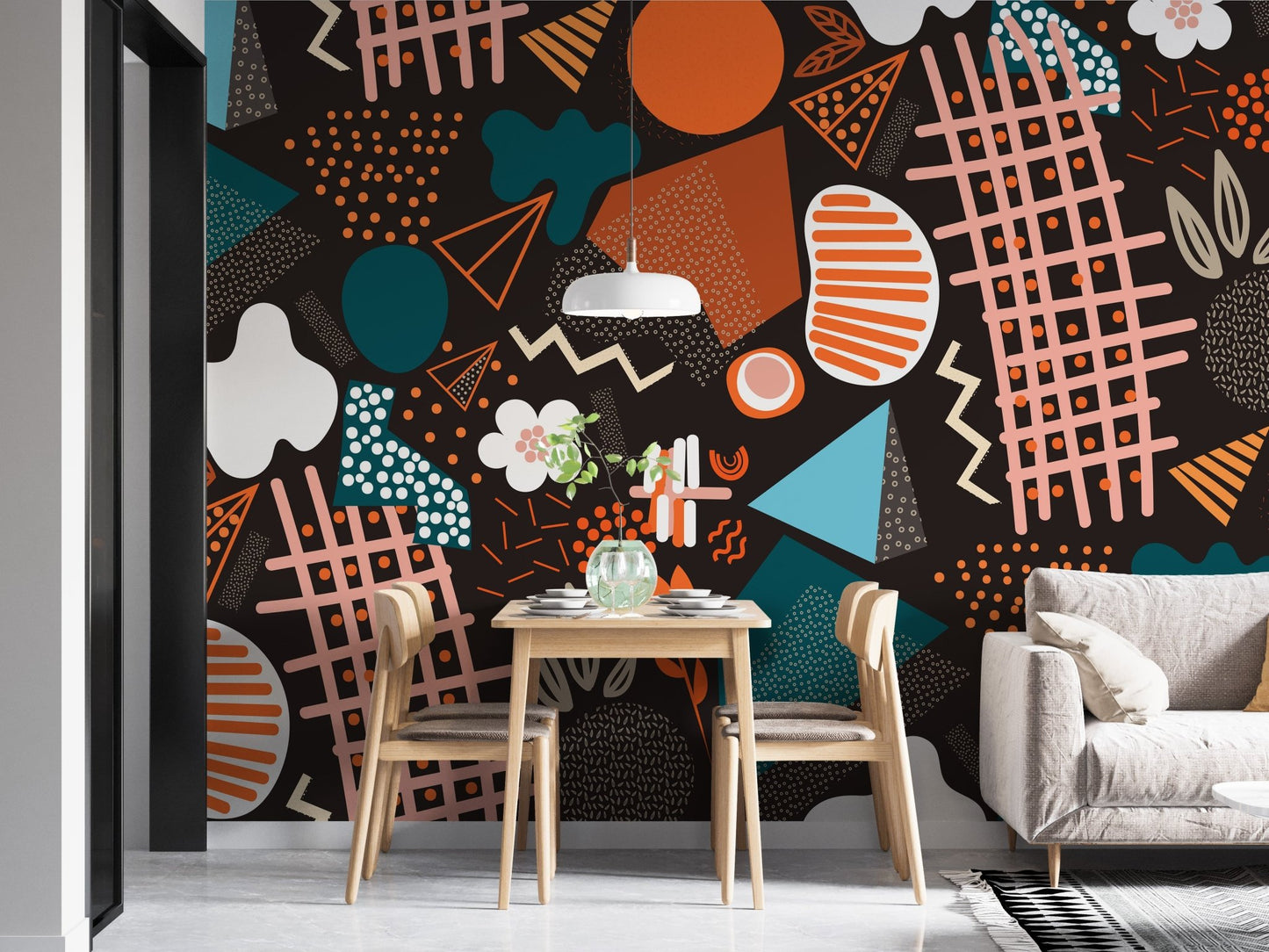 Small dining nook featuring abstract art wall mural and light wood chairs.