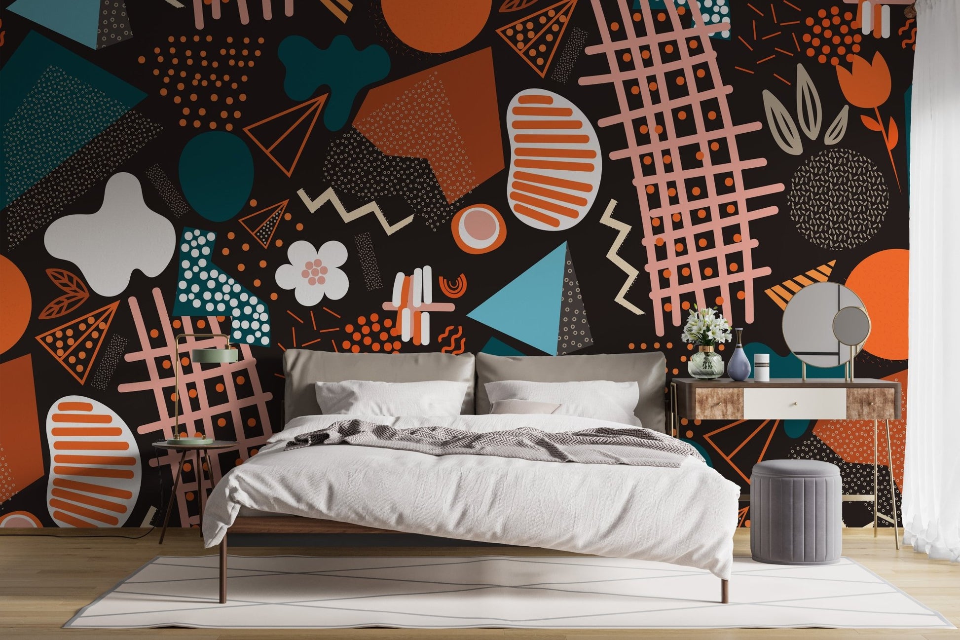 Minimalist bedroom with dark abstract geometric wall mural and furniture.