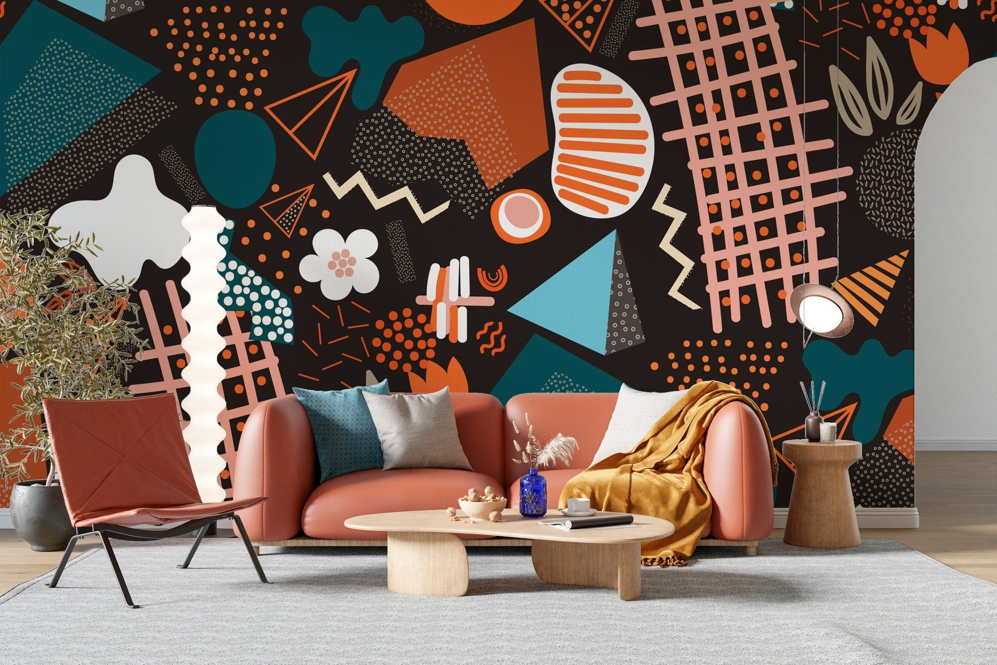 Living area with tan sofa and Abstract geometric art wall mural.