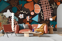 Living area with tan sofa and Abstract geometric art wall mural.