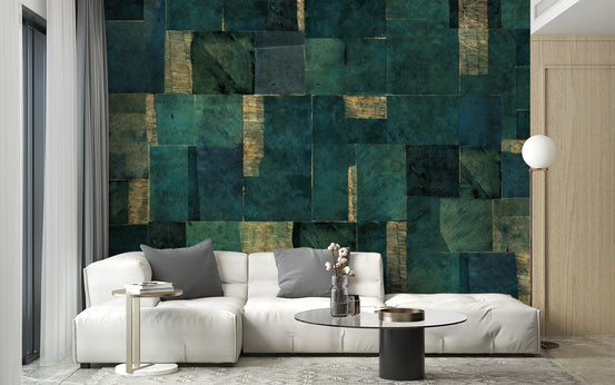 Abstract geometric wallpaper mural in deep green and gold panels.