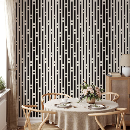 Abstract Lines Geometric Wallpaper in a dining room with a round table and tan chairs.
