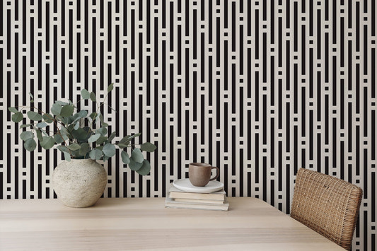 Abstract Lines Geometric Wallpaper on a study desk wall with a potted plant.