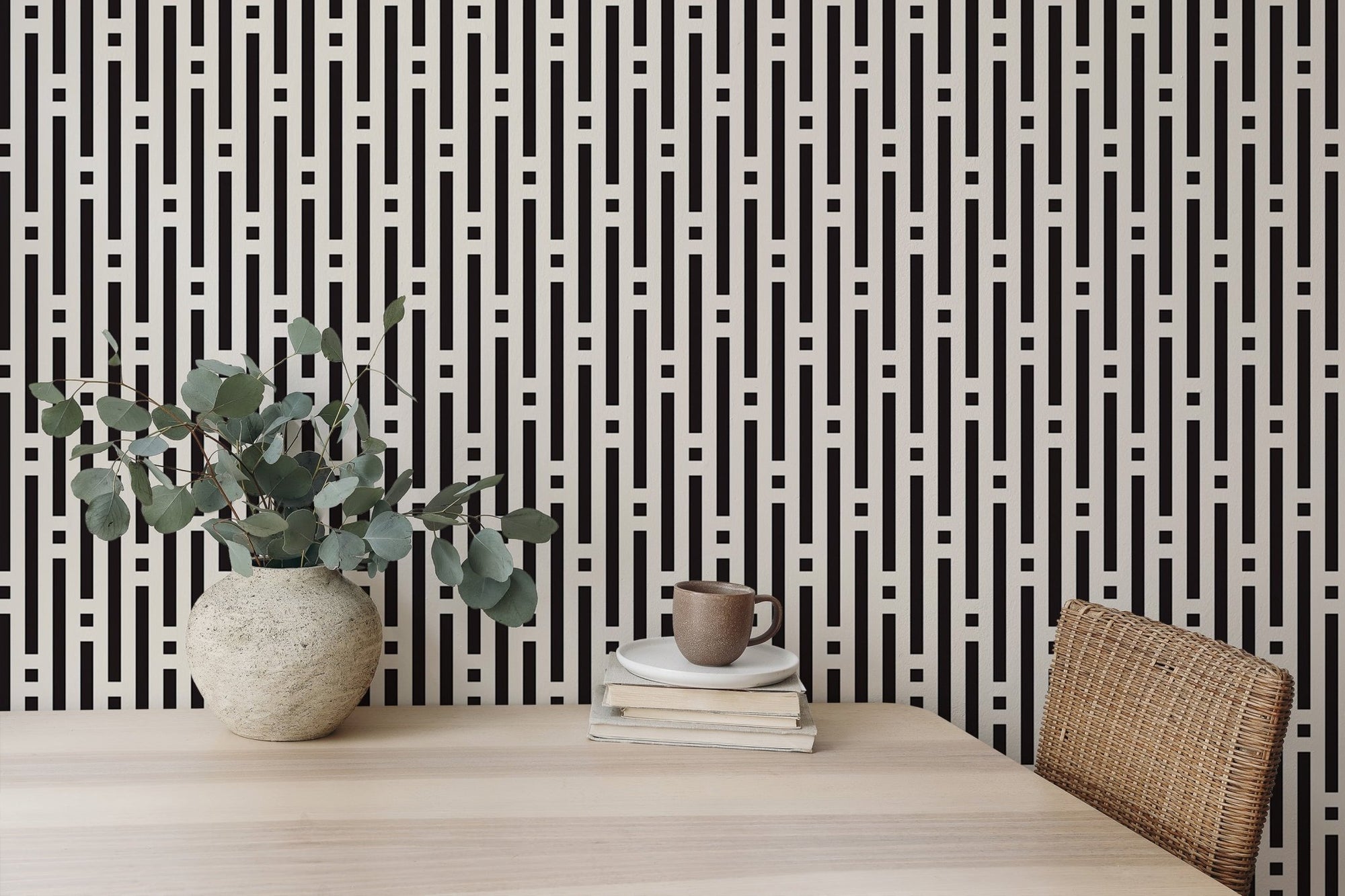 Abstract Lines Geometric Wallpaper on a study desk wall with a potted plant.