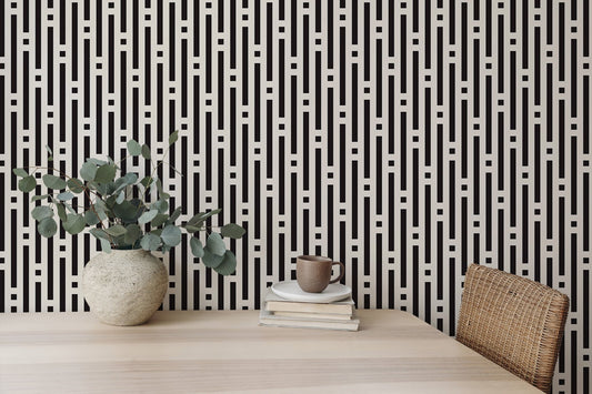 Abstract Lines Geometric Wallpaper on a study desk wall with a potted plant.