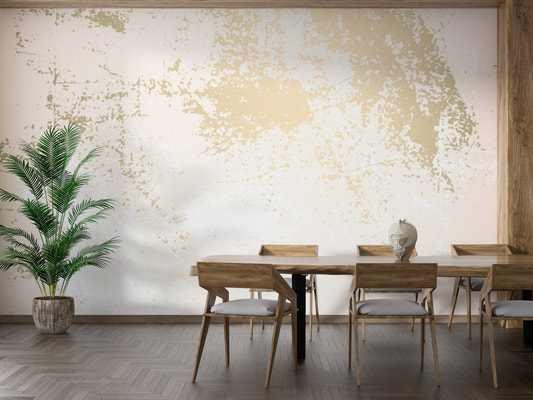 Dining room with wooden table and gold abstract marble wall mural.