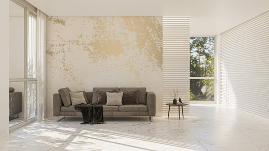 Open floor plan room with brown sofa and marble wall mural.