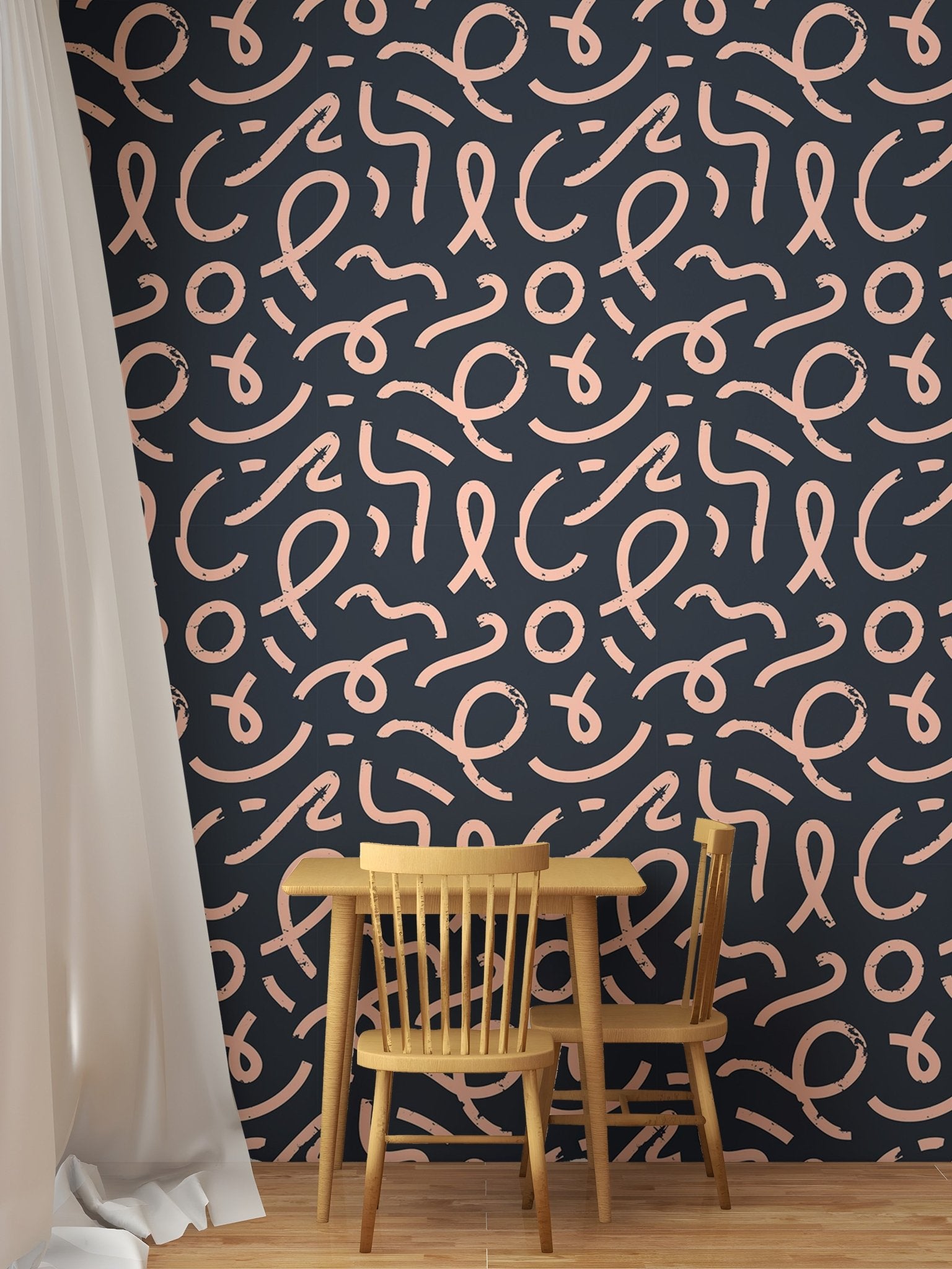 Dark blue wallpaper with squiggly pink lines in a small dining area.
