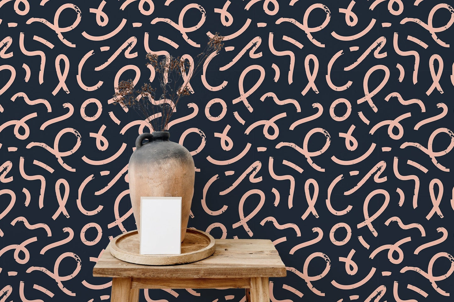 Minimalist line wallpaper with abstract patterns on a wooden console table.