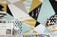 Abstract triangle wall mural featuring bold geometric patterns in kids room.
